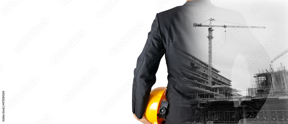Double Exposure Building Construction Engineering Project Concept Graphic designers, architects or construction workers with modern technology and equipment.