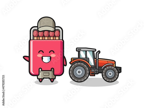 the matches box farmer mascot standing beside a tractor