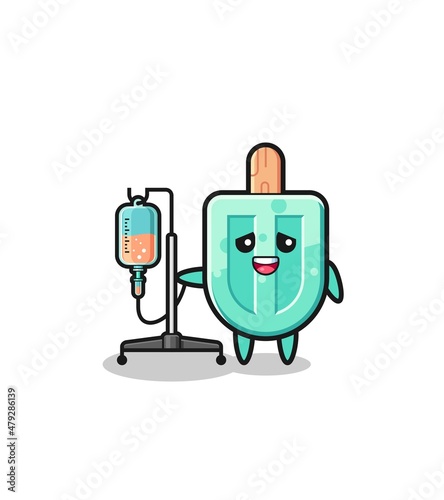 cute popsicles character standing with infusion pole