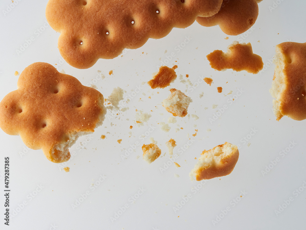 Crushed cracker and crumbs on white background Crushed cracker and crumbs on white background