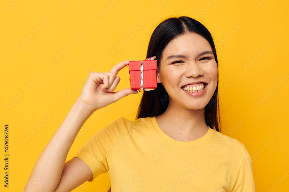 Portrait Asian beautiful young woman Little red gift box fun isolated background unaltered Portrait Asian beautiful young woman Little red gift box fun isolated background unaltered