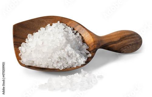 sea salt in wooden spoon and pile near isolated on white
