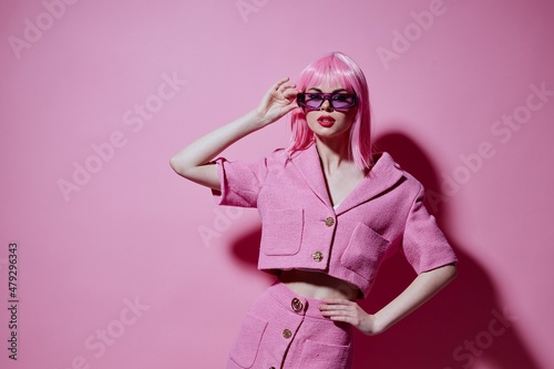 Pretty young female gestures with his hands with a pink jacket Studio Model unaltered © SHOTPRIME STUDIO