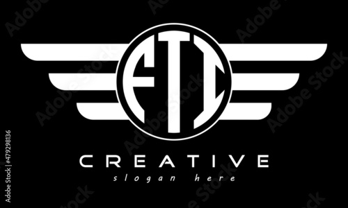 FTI three letter monogram type circle letter logo with wings vector template. photo