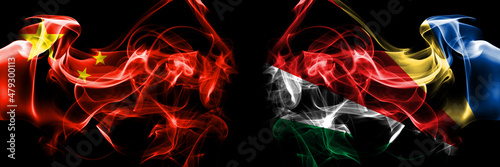 Flags of China, Chinese vs Seychelles, Seychellois. Smoke flag placed side by side on black background.