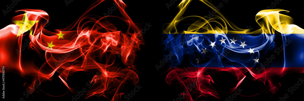 Fototapeta premium Flags of China, Chinese vs Venezuela. Smoke flag placed side by side on black background.
