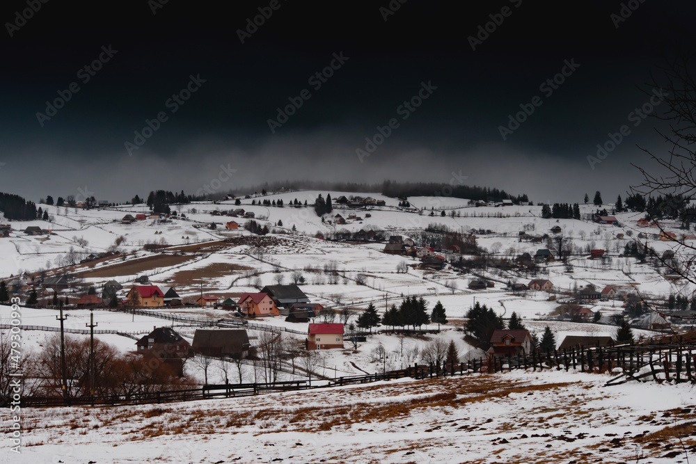 Winter idyllic village landscape in the Apuseni mountains
