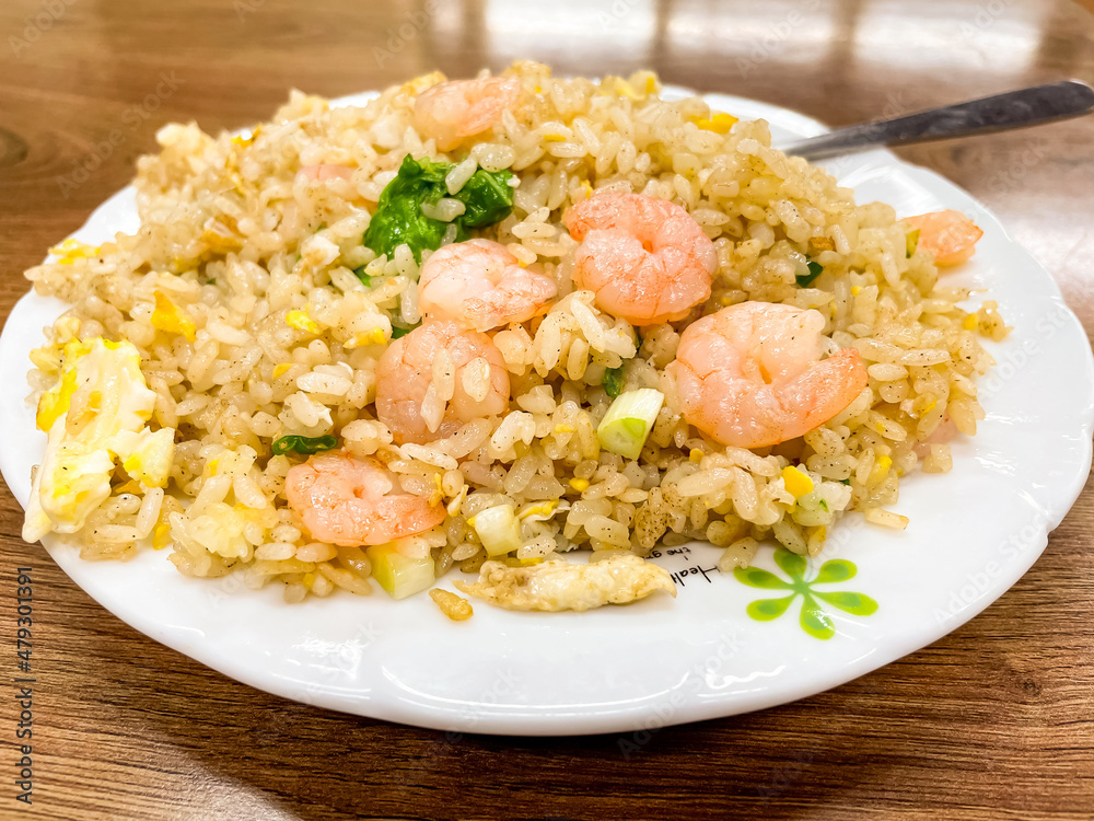 Fried rice with shrimp on the white dish Fried rice with shrimp on the white dish
