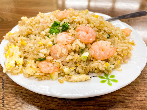 Fried rice with shrimp on the white dish