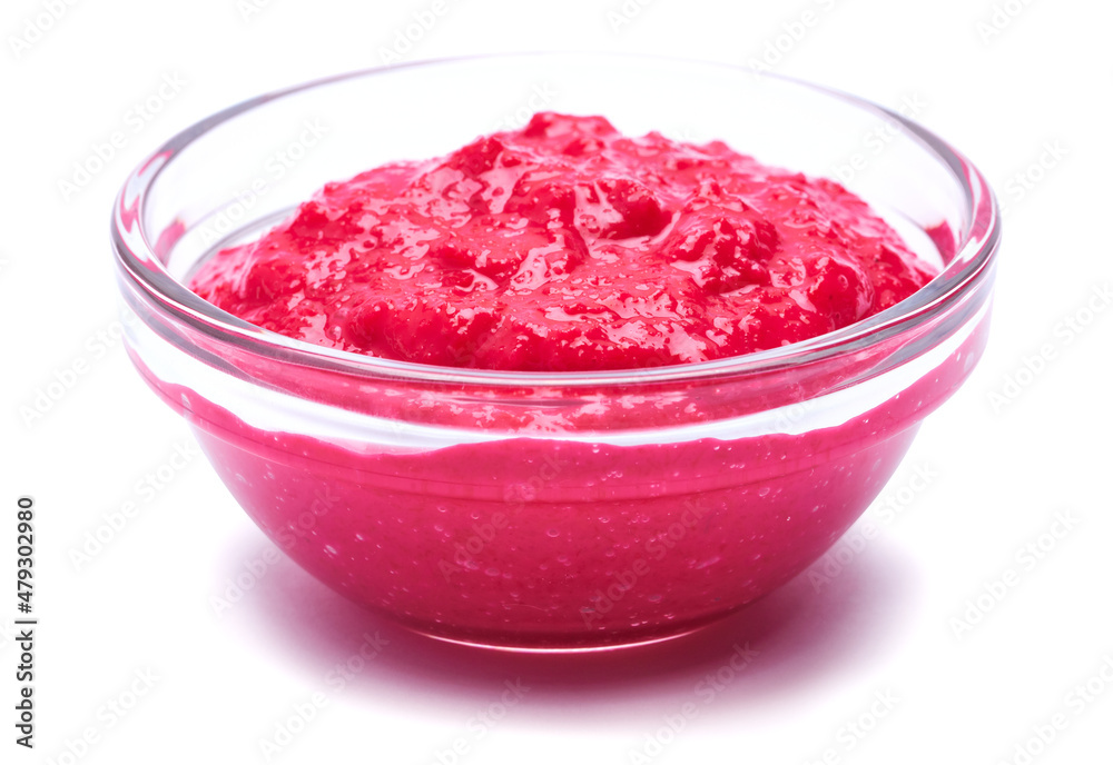 Horseradish red sauce in glass bowl isolated on white Horseradish red sauce in glass bowl isolated on white