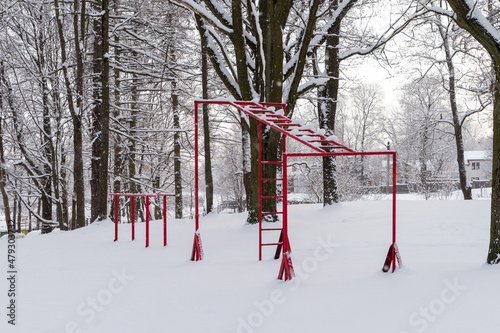 Red athletic equipment for outdoor training during winter