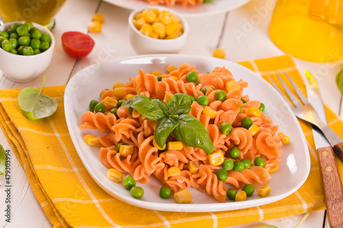 Fusilli pasta with peas and sweet corn.
