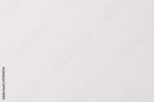 White paper background with canvas-like texture.