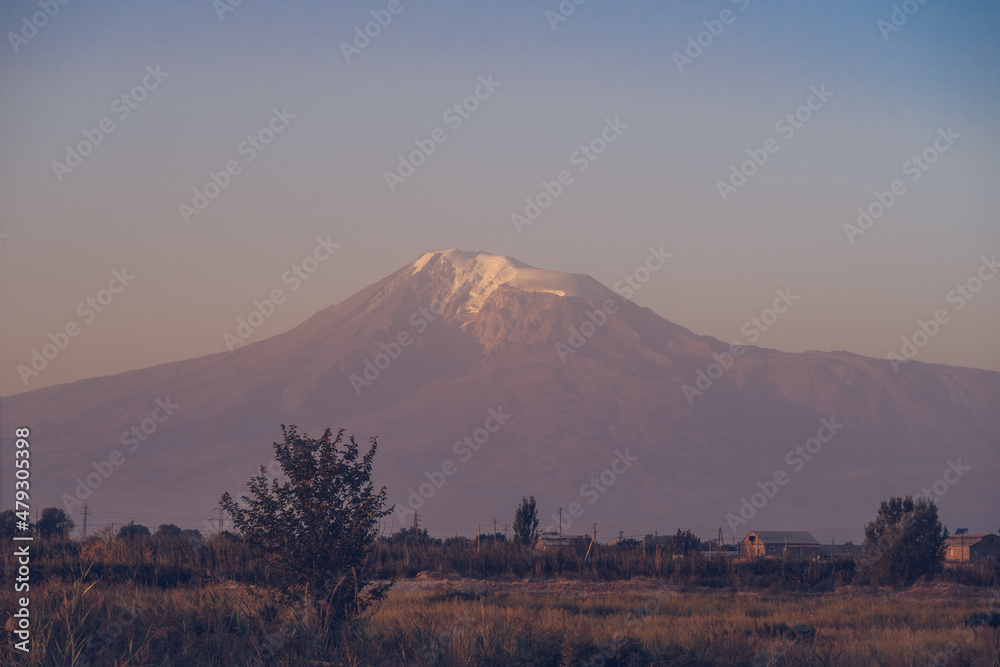 Aratrat mountain view. Village field in Ararat valley. View of Khor Virap and Mount Ararat. Armenia picturesque mountain range landscape. Stock photography