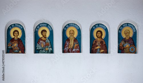 some icons with saints on the wall of the Sihla monastery - Romania photo