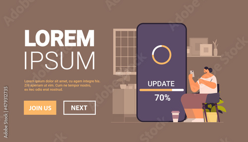 woman updating operating system update process install new software on smartphone horizontal