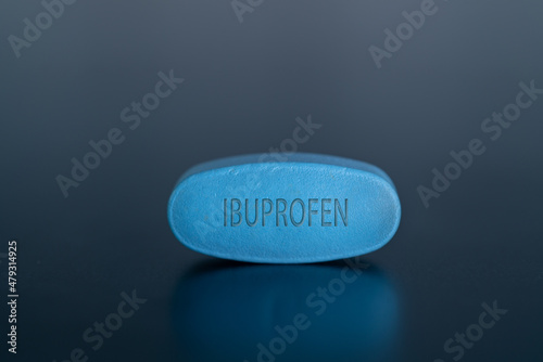 Ibuprofen pill Ibuprofen is a medication in the nonsteroidal anti-inflammatory drug photo