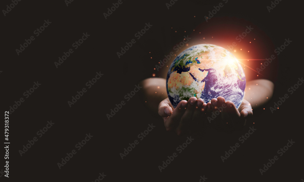 Man holding planet by two hands for earth day and saving energy environment concept with copy space ,Element of this image from NASA and 3d render. Man holding planet by two hands for earth day and saving energy environment concept with copy space ,Element of this image from NASA and 3d render.