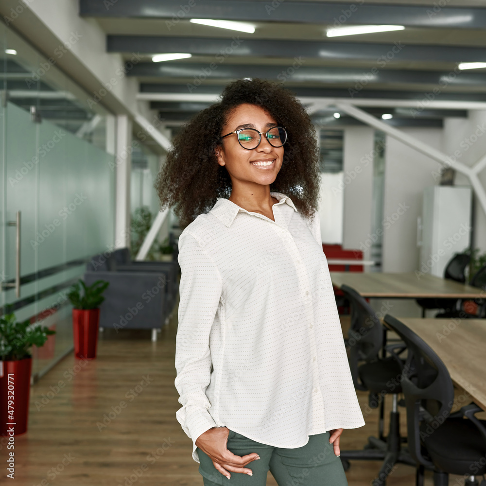 Young black woman in glasses looking at camera Young black woman in glasses looking at camera