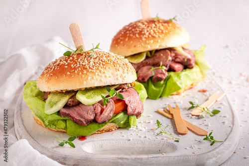 Homemade hamburger with beef, vegetables and sesame