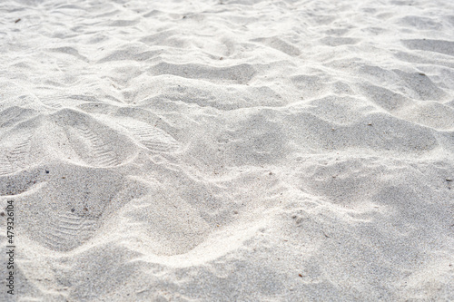 Sea beach sand with foot print texture background