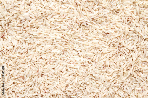 Close up of organic raw rice can be use as background 