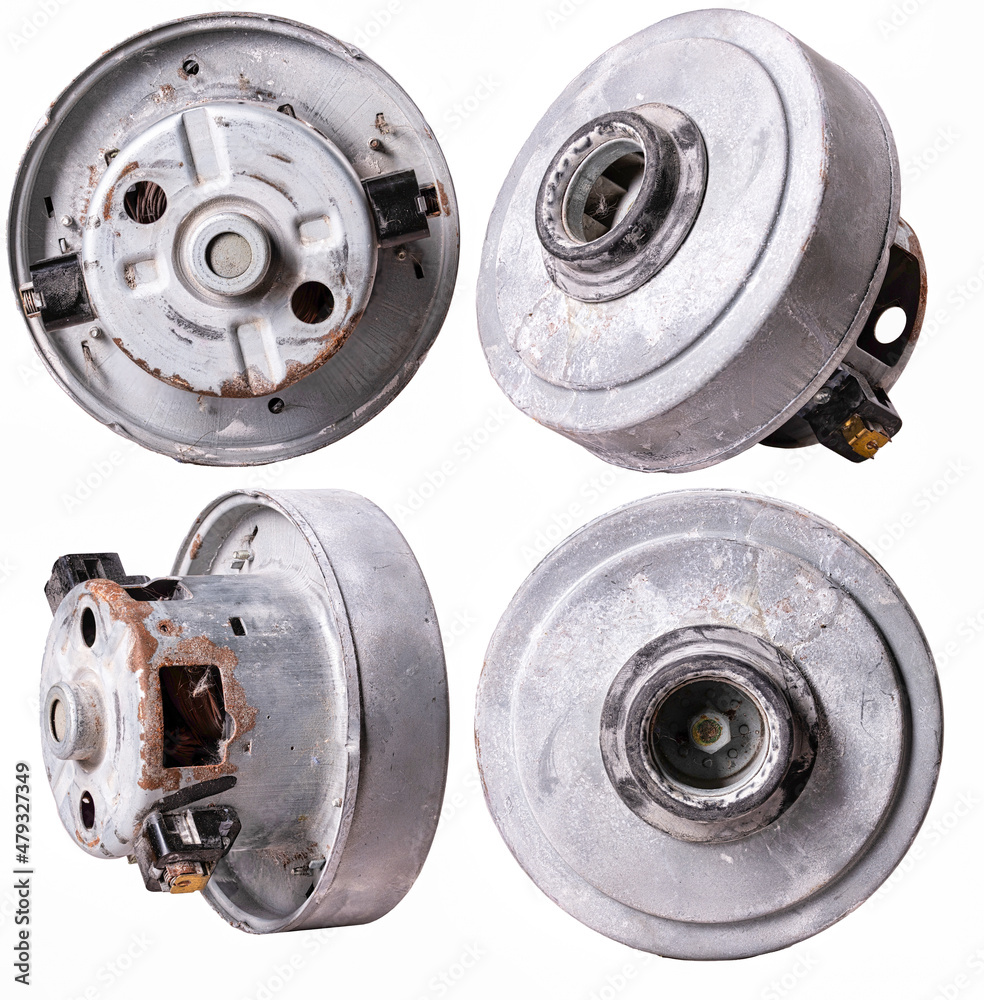 Old dirty electric motor used in household vacuum cleaners.