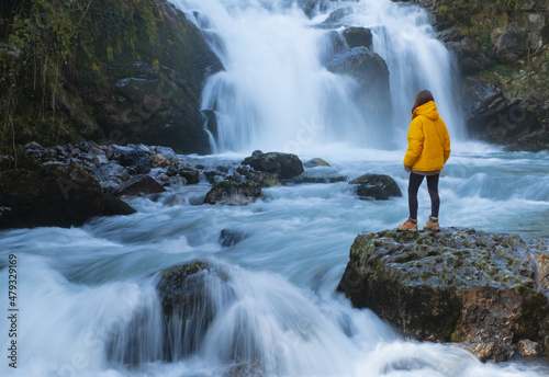 Woman in the Natural waterfall of Ixkier, Sierra de Aralar, Navarra, Spain photo