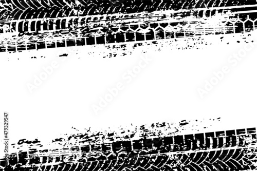 Tire tracks on dirt asphalt road, black abstract ink grunge texture of car or bike