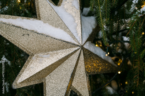 Close-up of decorated Christmas tree on Town Hall square in Riga, Latvia. Winter holiday. photo