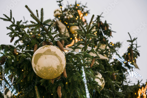 Close-up of decorated Christmas tree on Town Hall square in Riga, Latvia. Winter holiday. photo