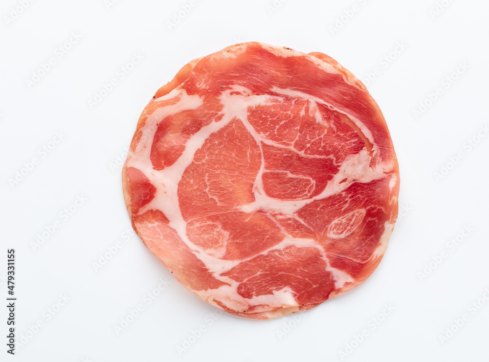 Italian prosciutto crudo or jamon. Raw ham. Isolated on white background. Italian prosciutto crudo or jamon. Raw ham. Isolated on white background.