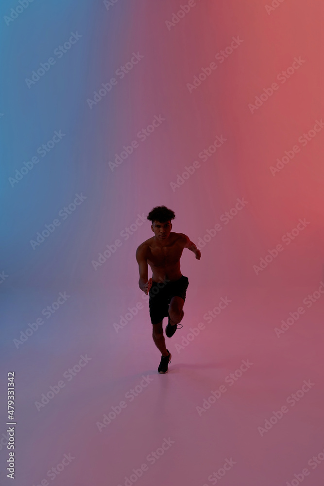 Black sports man running during sport training