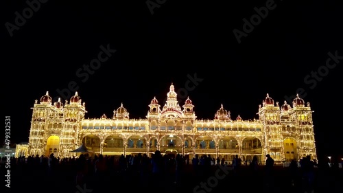 A Bewitching dusk view of the famous landmark the Ambavilas Royal Palace in Mysore seen illuminated and is an important travel destination in Karnataka, India.
 photo