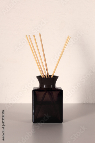 Close-up liquid aroma diffuser with wooden sticks for home