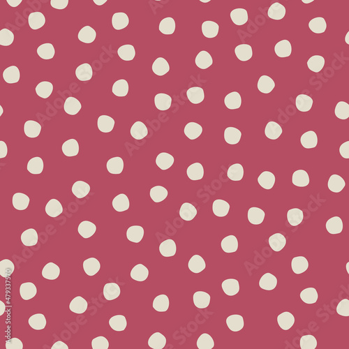 Seamless hand drawn polka-dot pattern on Crimson background for surface design and other design projects