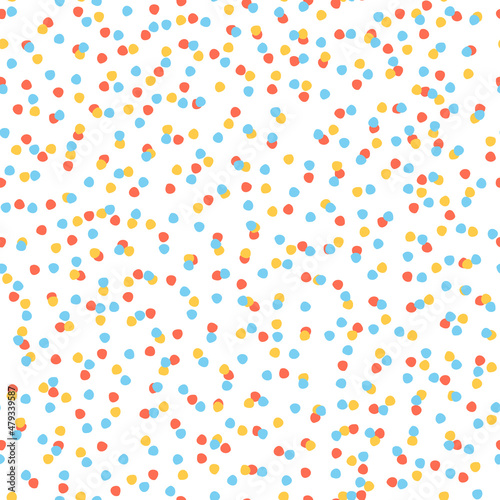 Seamless repeating spotted pattern with tiny colorful hand drawn confetti-like dots. Christmas, snowy winter, sky concept. Vector background for gift wrap, surface design and other design projects