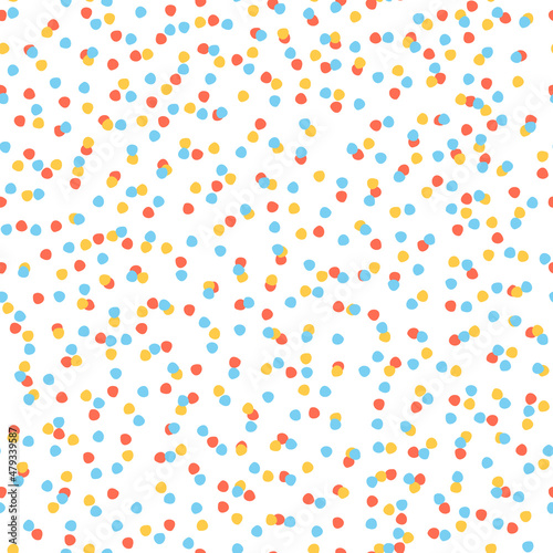 Seamless repeating spotted pattern with tiny colorful hand drawn confetti-like dots. Christmas, snowy winter, sky concept. Vector background for gift wrap, surface design and other design projects