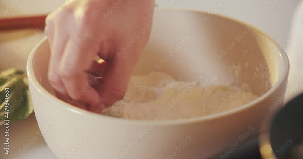 Soaking Shiso Perilla Leaves in Flour Liquid for Deep Frying Tempura Soaking Shiso Perilla Leaves in Flour Liquid for Deep Frying Tempura