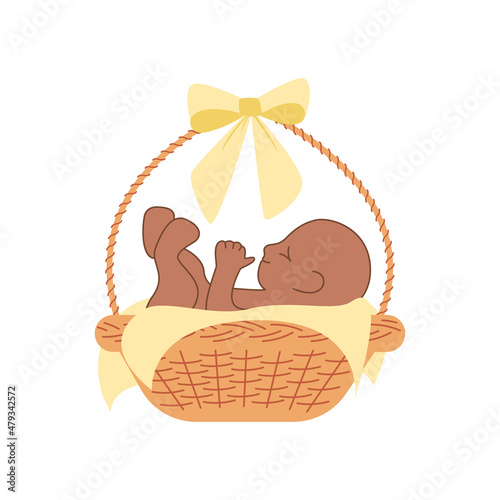 baby in basket with yellow bow
