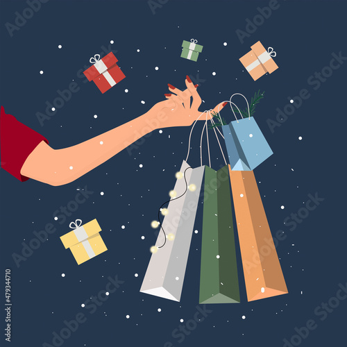 hand with bags and gifts