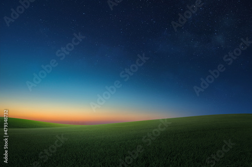 Hilly grass landscape with twilight sky background.