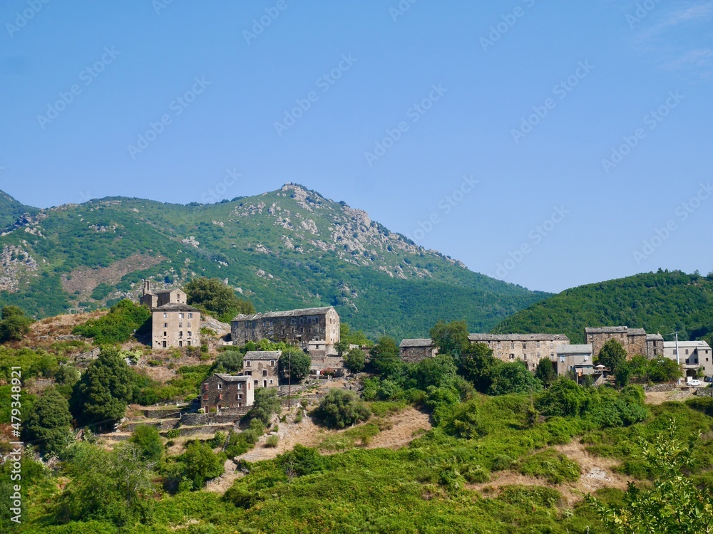 Panoramic view of Campi, a dreamy mountain village nestled in the mountains of Castagniccia. Corsica, France.