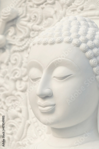 face of white stone buddha