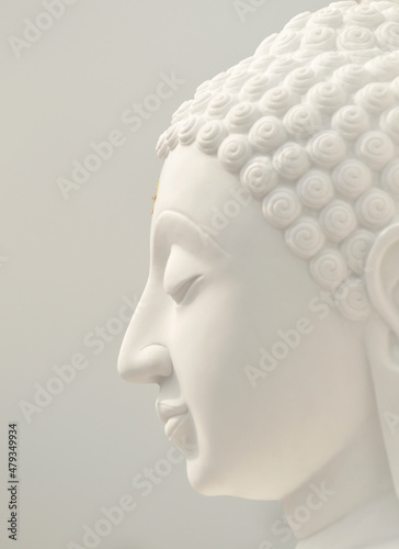 face of white stone buddha