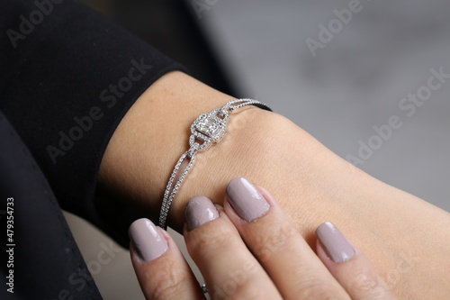 gold and diamond women's fashion and accessories. Hand Model Jewelry Piece. women bracelet