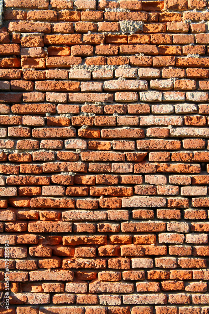 Obraz premium Muro di mattoni rosso
