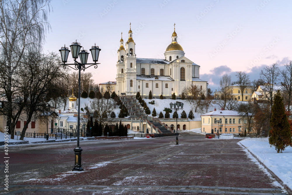 View of the Holy Spirit Monastery and the Holy Dormition Cathedral on the Assumption Mountain on a winter evening from Pushkin Street, Vitebsk, Belarus