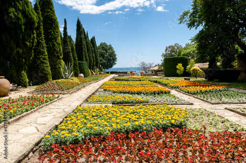 The botanical garden full of colorful flowers in Balchik, Bulgaria photo