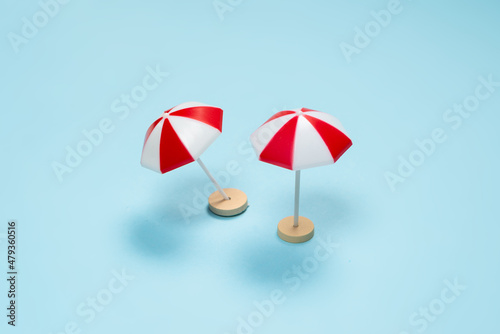 Wallpaper Mural Red umbrella on a blue background. Torontodigital.ca